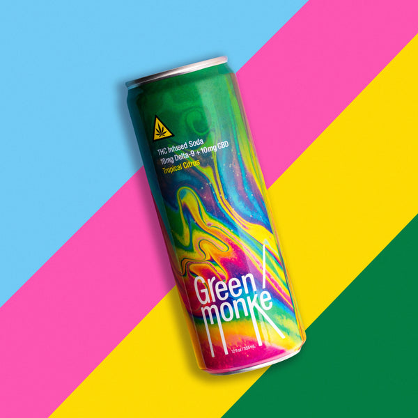 Green Monké Tropical Citrus THC soda can on a bold colorblock background