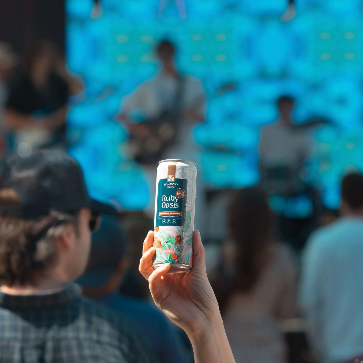 Ruby Oasis THC lemonade can at an outdoor concert