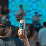 Ruby Oasis THC lemonade can at an outdoor concert