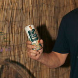 Man drinking Hometown Hero Peachy Dream THC lemonade
